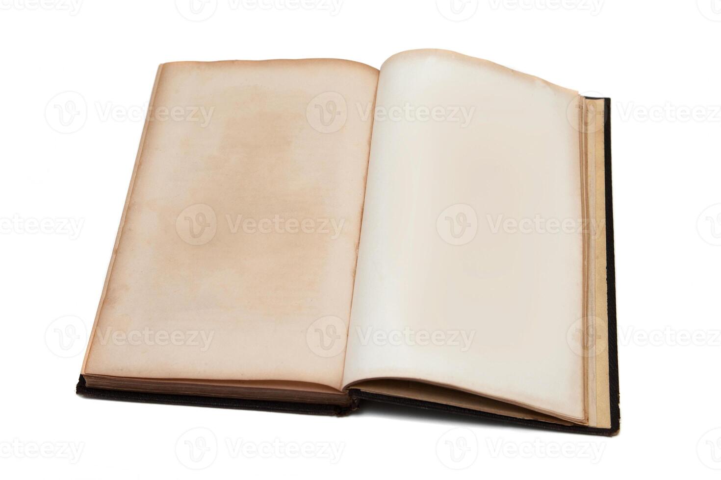 Old vintage book with yellowed aged pages isolated on white background. photo