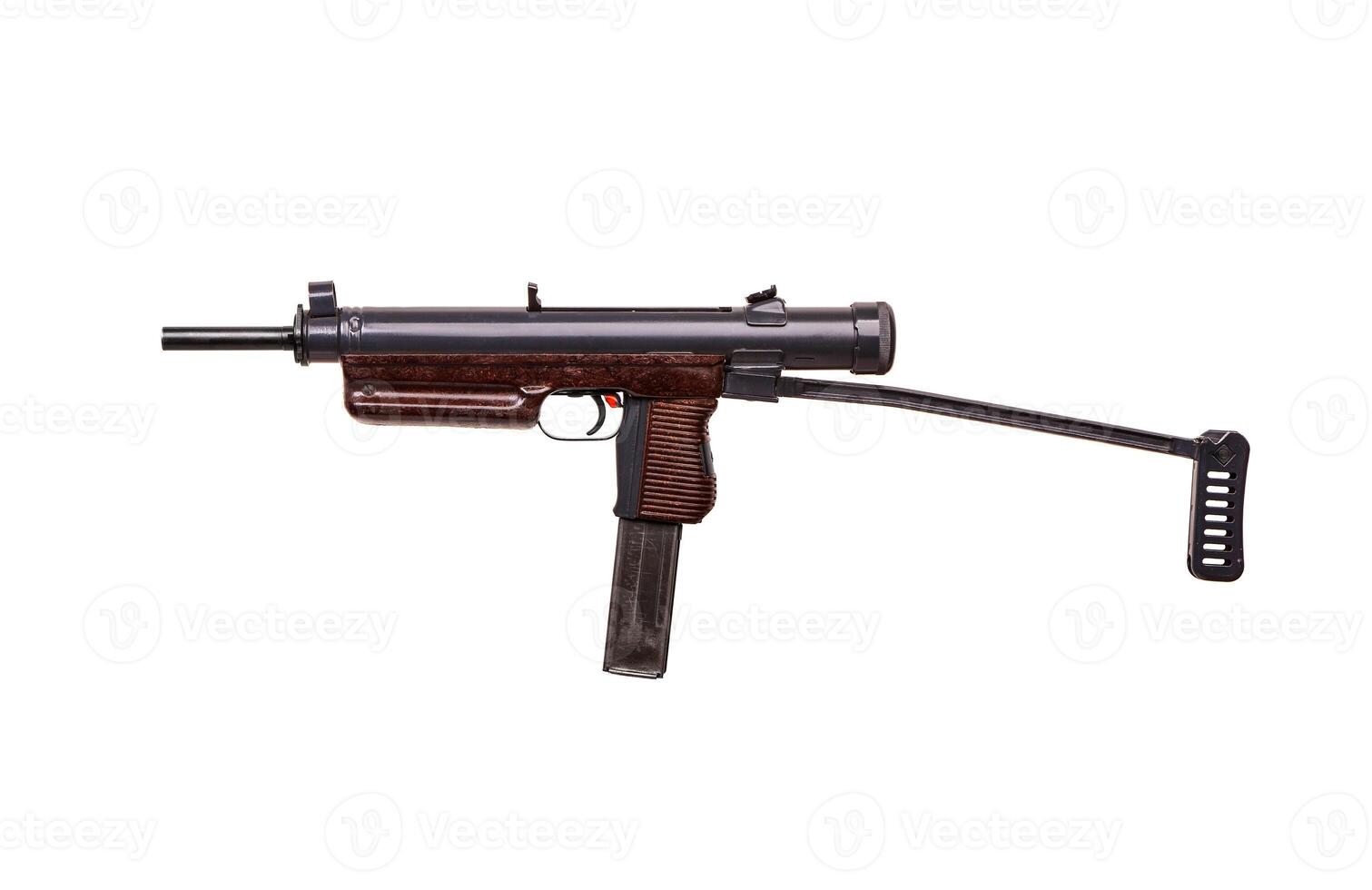 Vintage submachine gun isolate on white background. Weapons for the army and special forces of the past. Short automatic submachine gun. photo