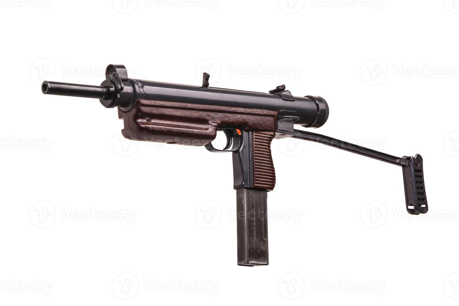 Vintage submachine gun isolate on white background. Weapons for the army and special forces of the past. Short automatic submachine gun. photo
