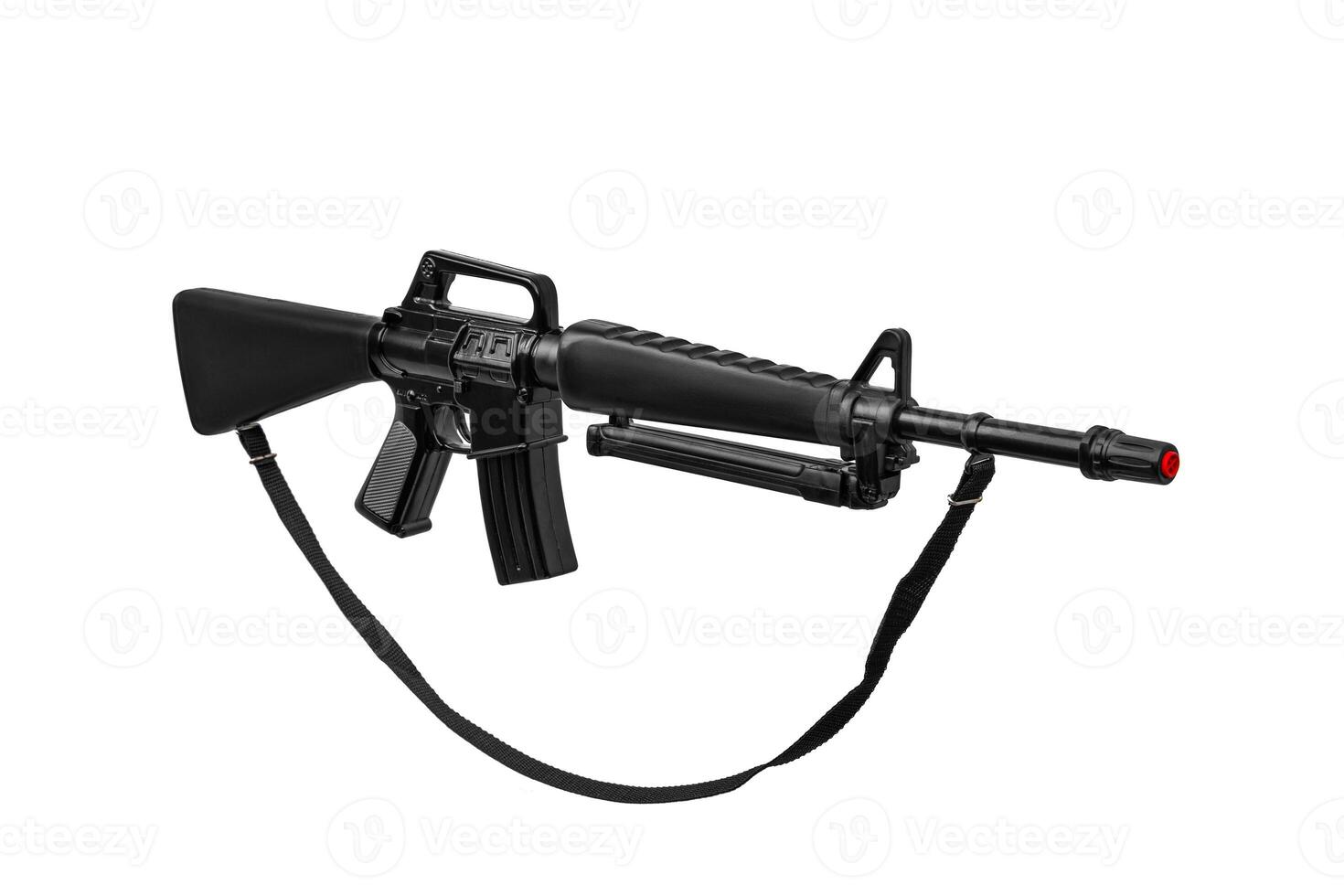 Black toy plastic rifle. Children's not real weapons m16 carbine. Gun isolate on a white back. photo