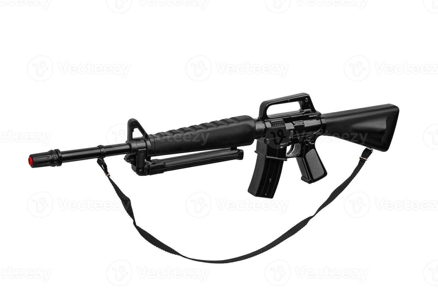 Black toy plastic rifle. Children's not real weapons m16 carbine. Gun isolate on a white back. photo