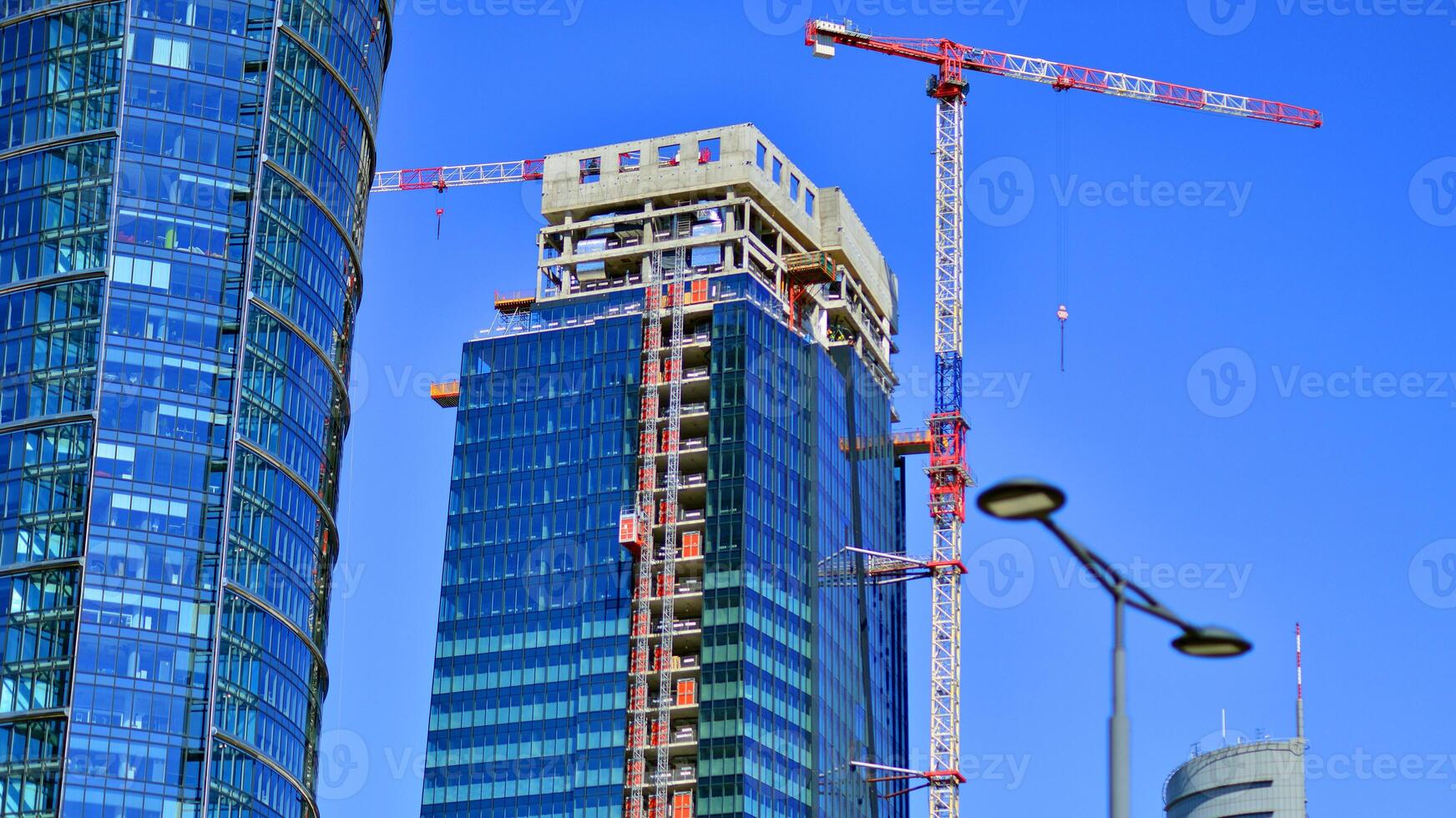 Modern sustainable glass office buildings. Exterior view of corporate headquarters glass buildings architecture.Glass windows in energy-efficient buildings. Financial business center buildings. photo