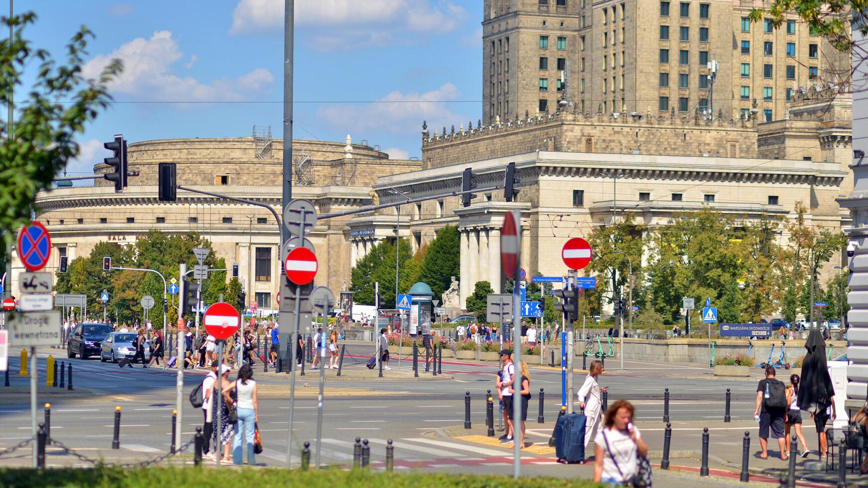 Warsaw, Poland. 17 August 2024. Urban landscape with buildings and cars in the Srodmiescie district. photo