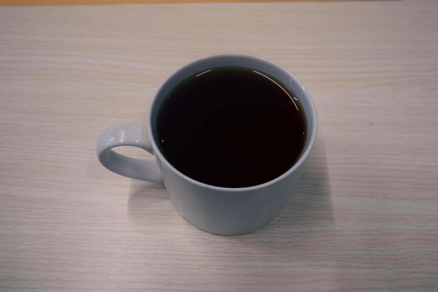 Vietnam Style Drip Coffee with Condensed Milk at the Bottom to Add Sweetness, Close Up photo