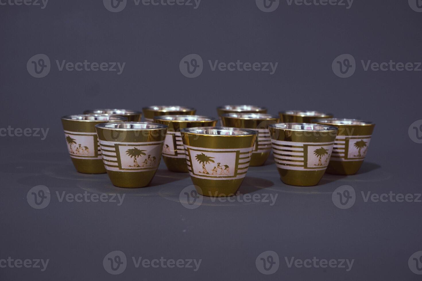 Minimal abstract background with set of teacup. Against the grey background. Front view, copy space photo