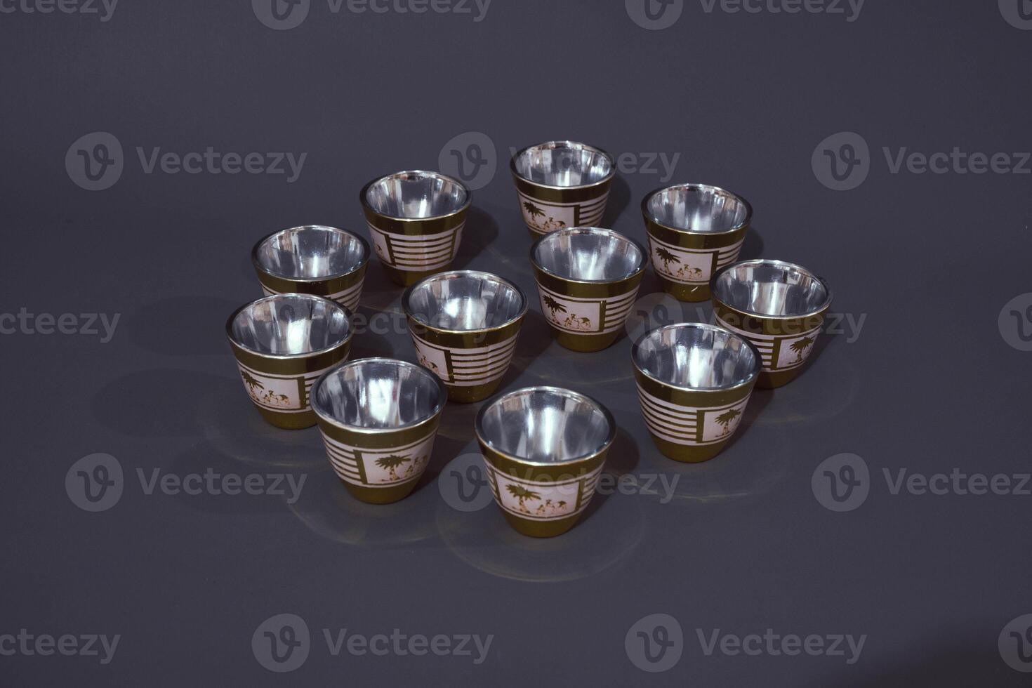 Minimal abstract background with set of teacup. Against the grey background. Front view, copy space photo
