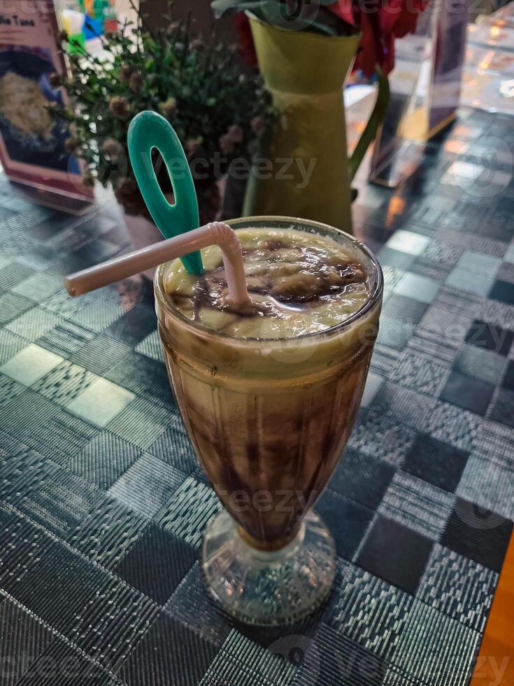 Avocado Smoothie, Made with Fresh Avocados or avocado juice or jus alpukat. Food photography photo