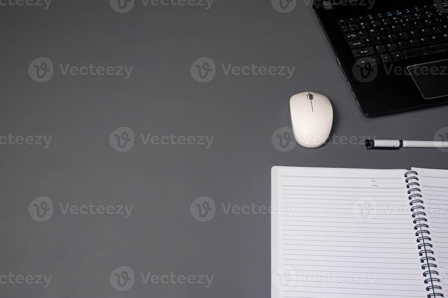 Workplace on isolated gray background with empty space photo