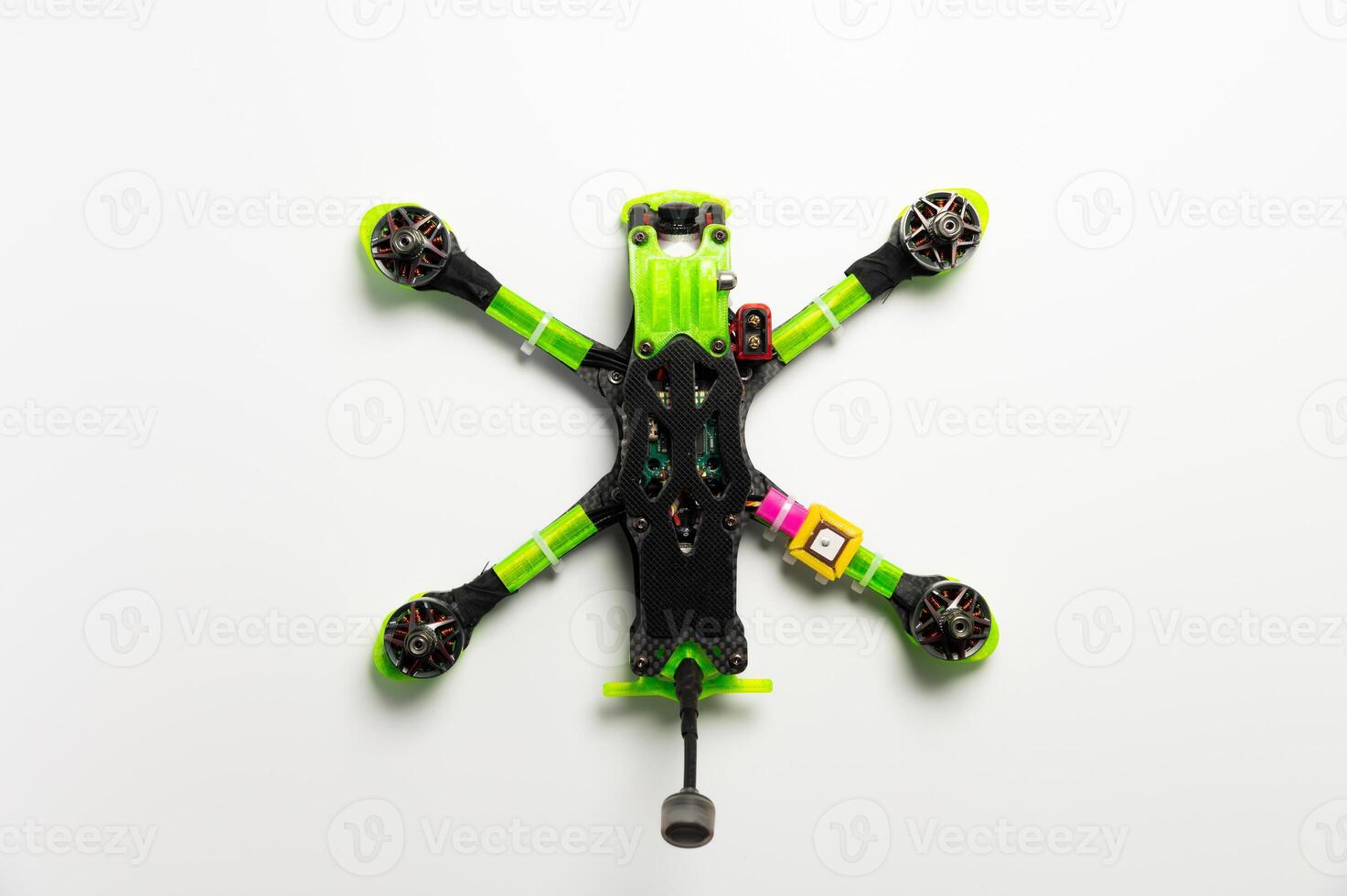 top view, twisting drone frame parts, soldering and assembling fpv drone parts, human-assembled aircraft model. Close-up, high technology, drones photo