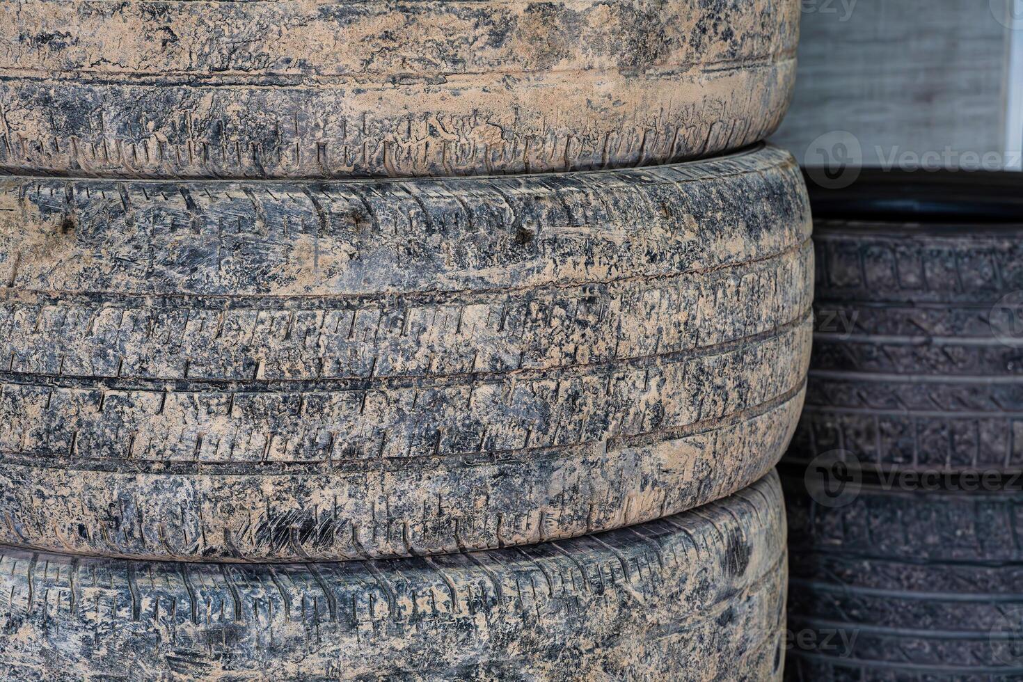 Stacked Worn Car Tires photo