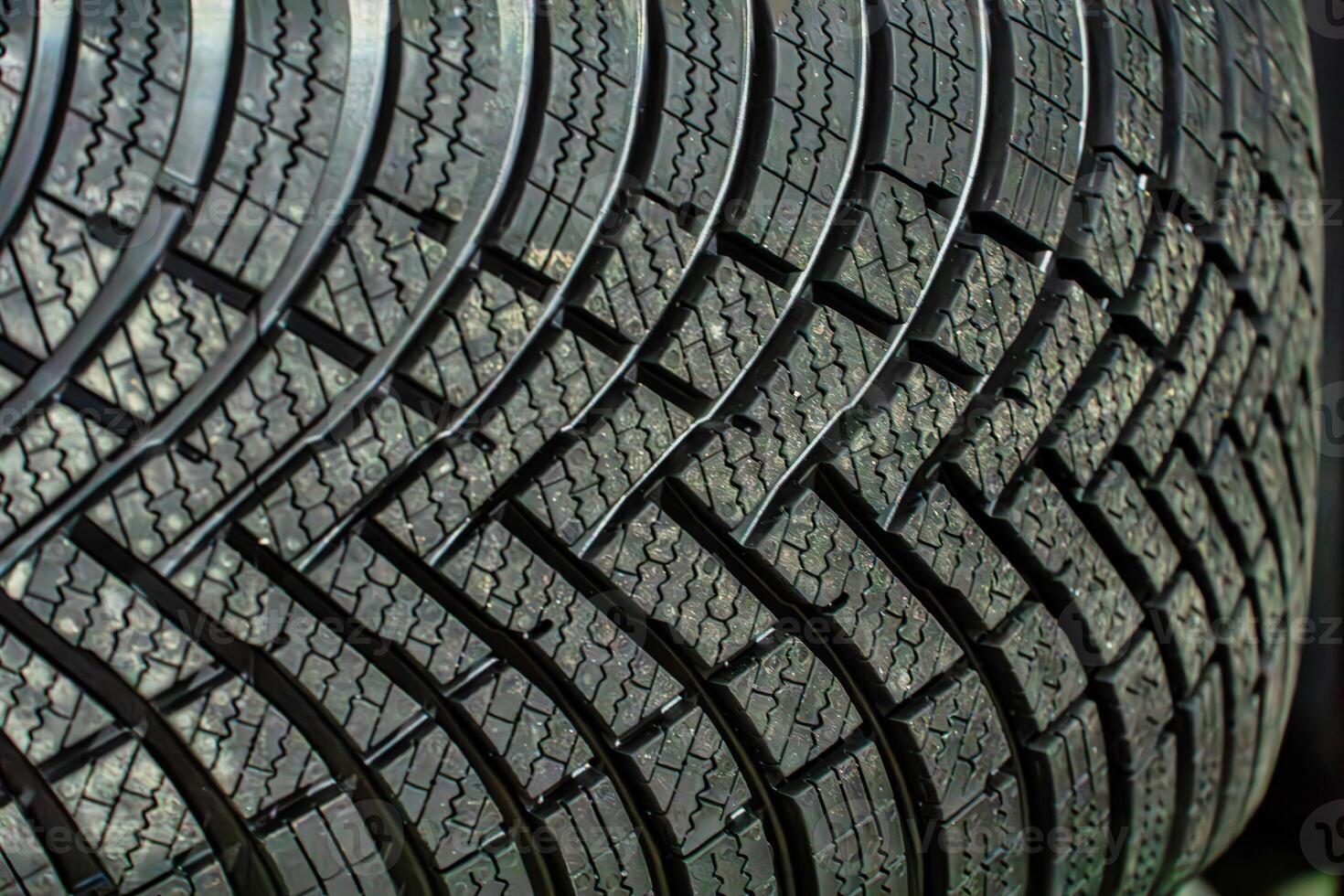 Close-Up of a Car Tire Tread Pattern photo
