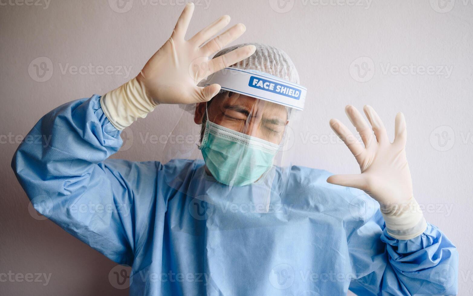 Healthcare worker having stress after he was bullying from other in hospital. Bullying can range from mild teasing through to more serious abuse. photo