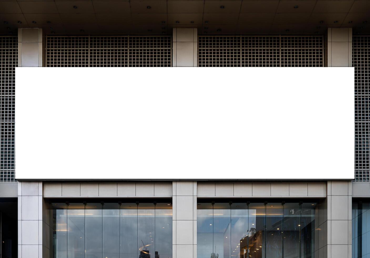 Mock up white horizontal billboard on entrance building. Clipping path for mockup photo