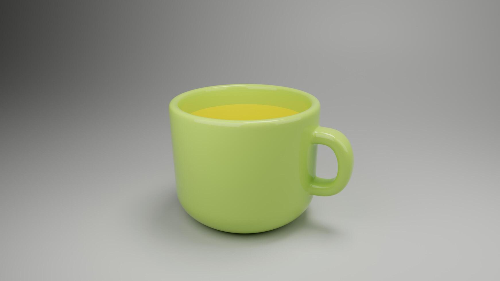 a green cup with a yellow handle on a gray surface photo