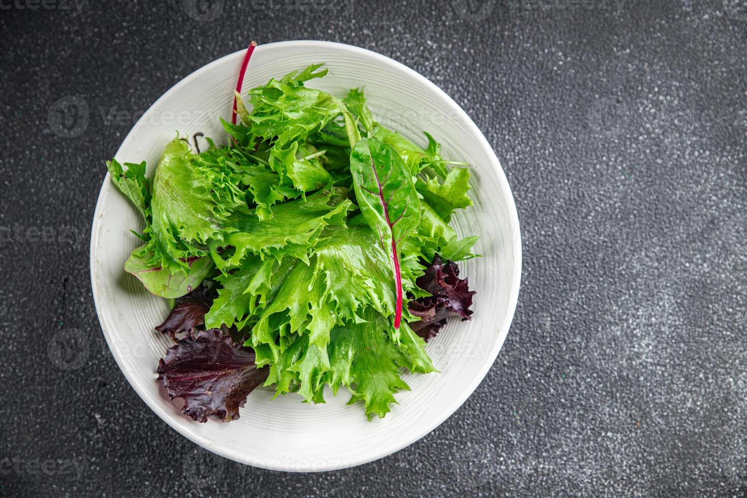 salad green leaves mix salad fresh meal food snack on the table copy space food background rustic top view keto or paleo diet vegetarian vegan food photo