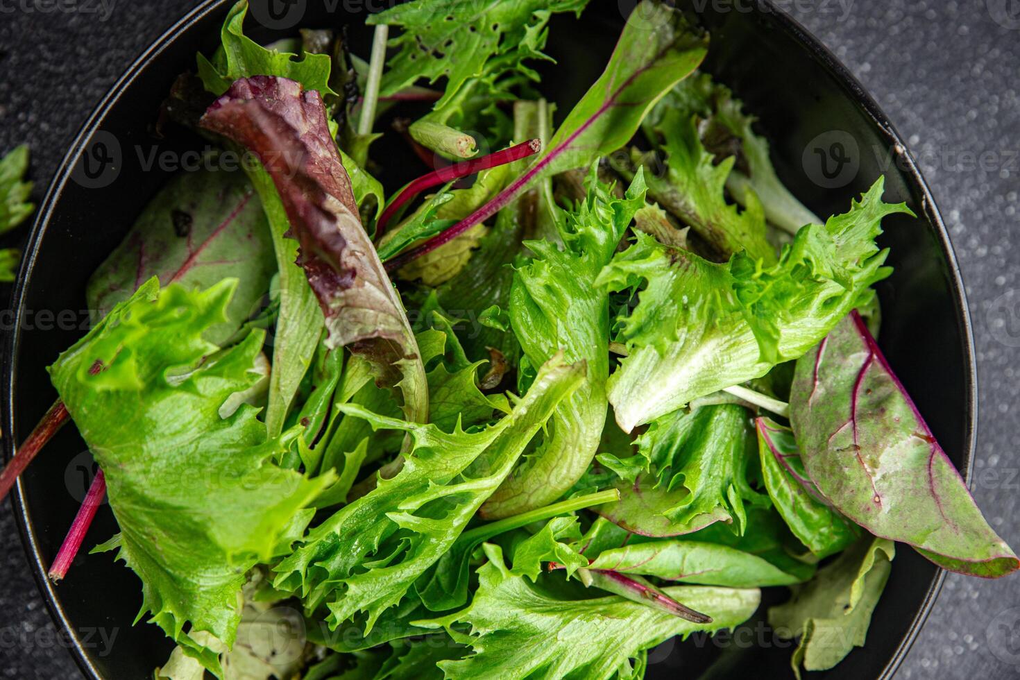 salad green leaves mix salad fresh meal food snack on the table copy space food background rustic top view keto or paleo diet vegetarian vegan food photo