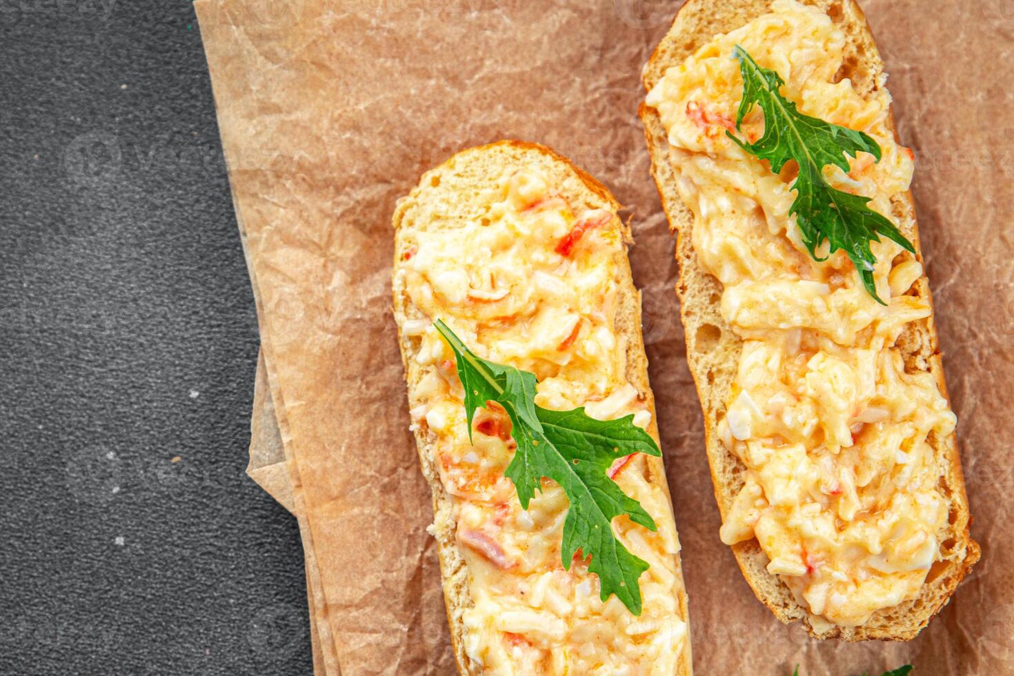 smorrebrod salad spread surimi and crab sticks, mayonnaise fresh meal food snack on the table copy space food background rustic top view photo