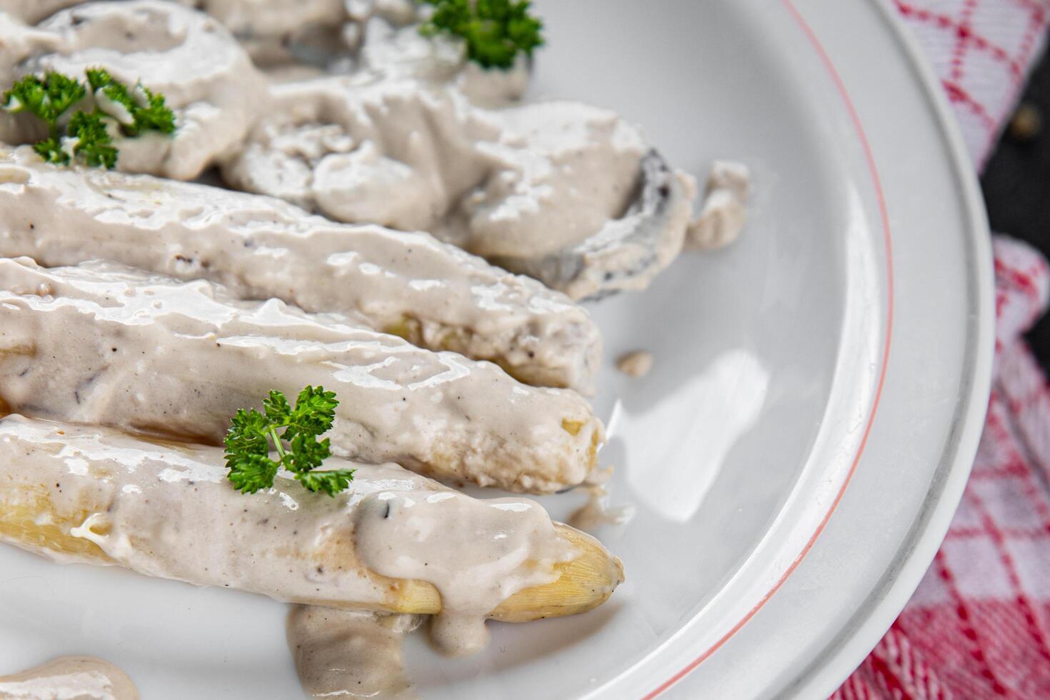 white asparagus in cream sauce fresh meal food snack on the table copy space food background rustic top view photo