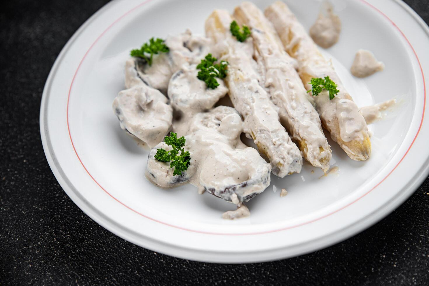white asparagus in cream sauce fresh meal food snack on the table copy space food background rustic top view photo