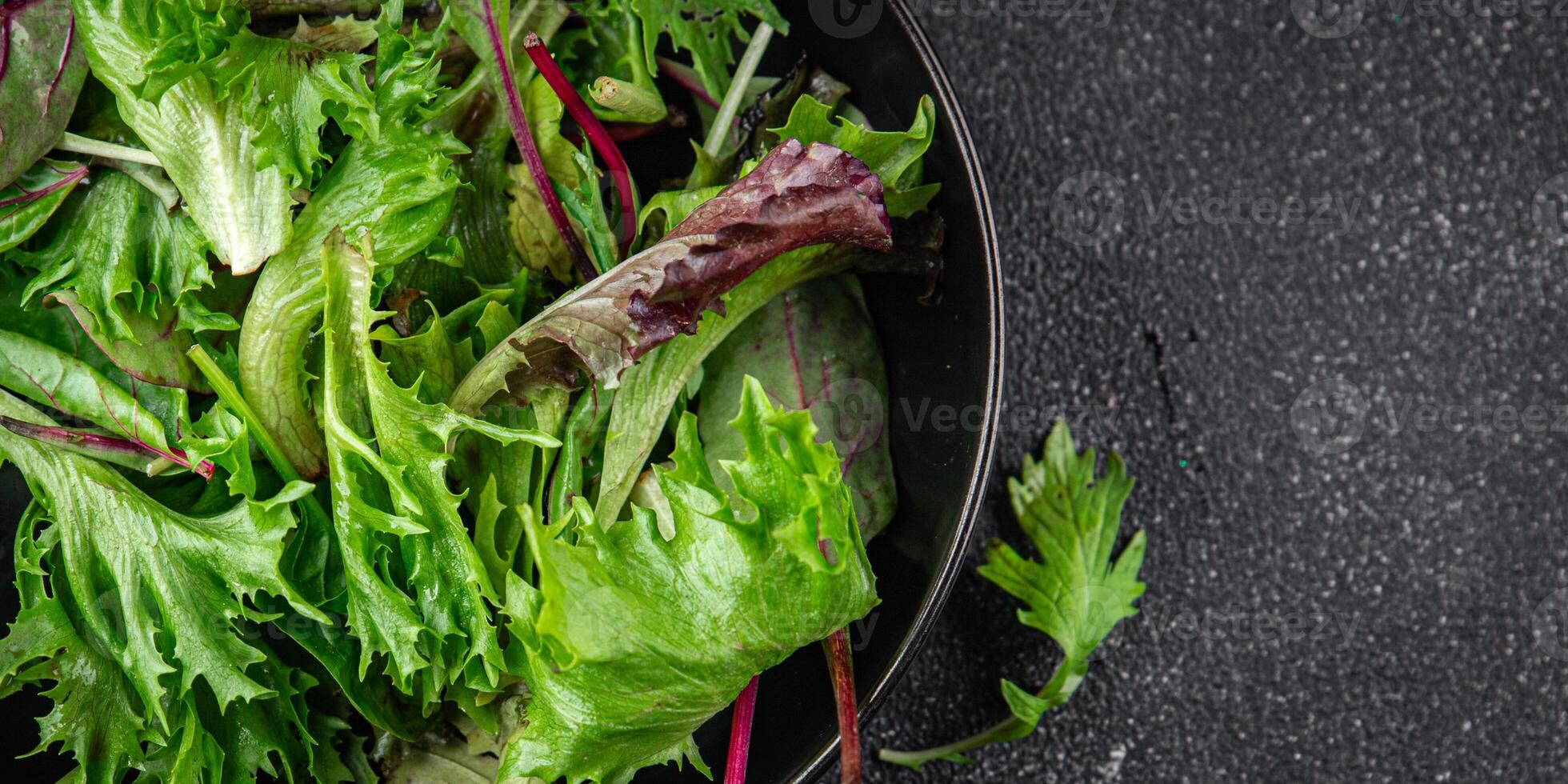 salad green leaves mix salad fresh meal food snack on the table copy space food background rustic top view keto or paleo diet vegetarian vegan food photo