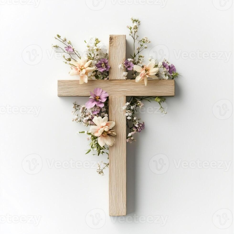 Wooden cross adorned with delicate flowers on a minimalist white background photo