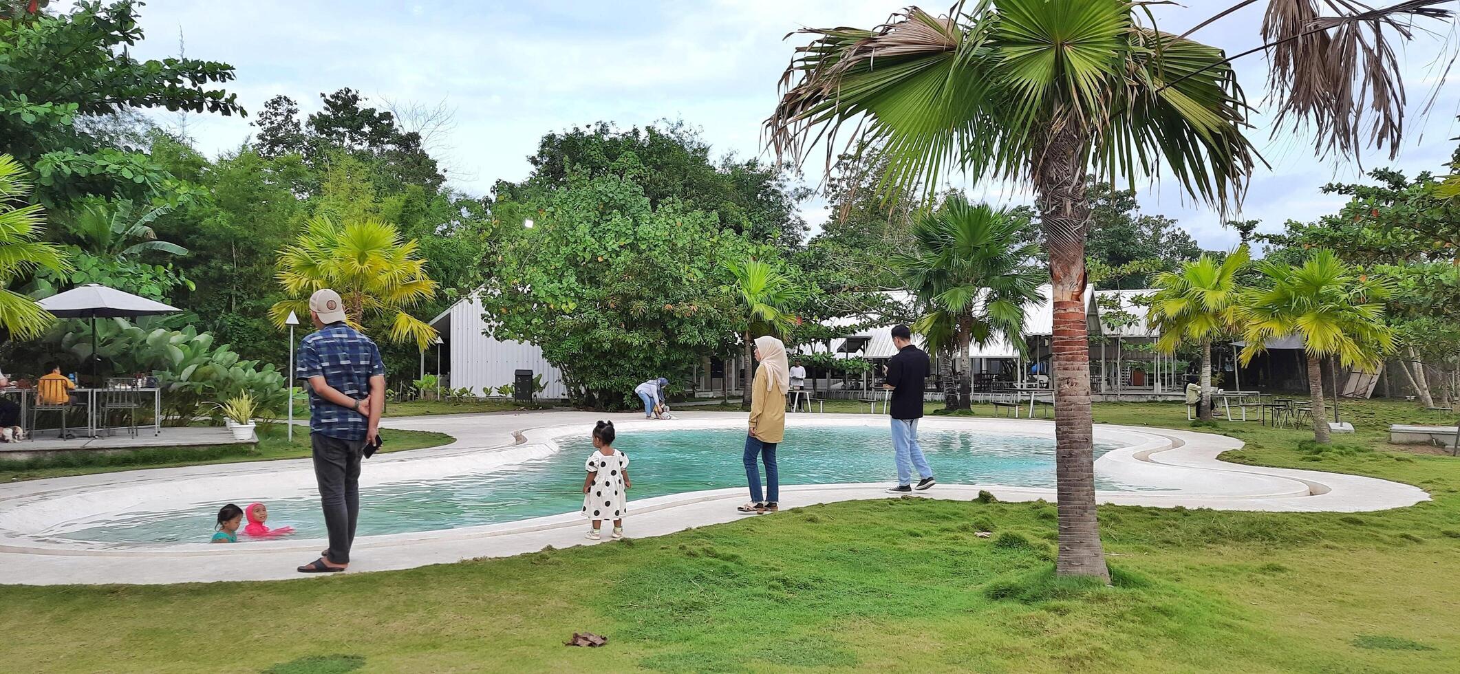 Beautiful view of The Danau Resort and Villa or Bebek Tepi Sawah famous Restaurant cabang Ubud Bali in Makassar - Gowa. South Sulawesi, Indonesia - August 7 2024 photo