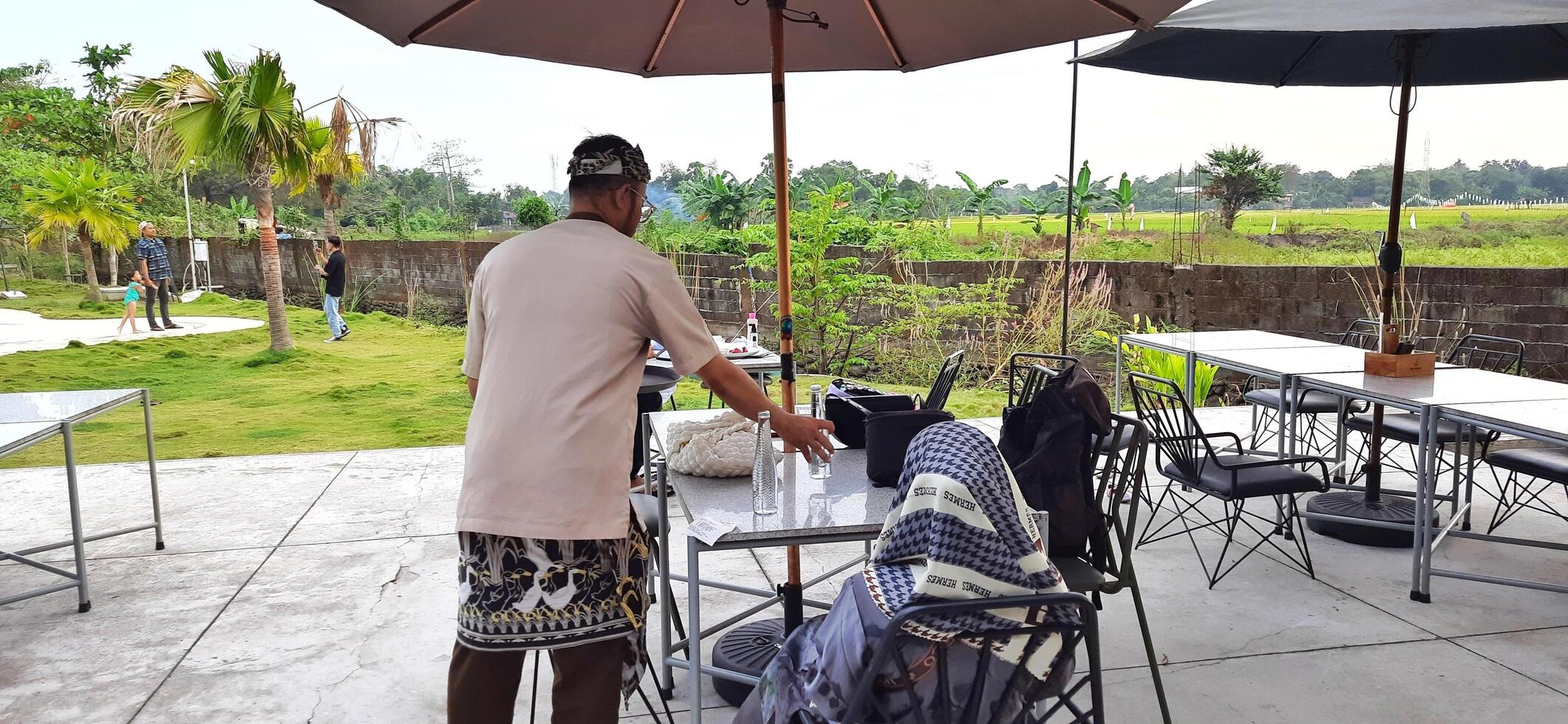 Beautiful view of The Danau Resort and Villa or Bebek Tepi Sawah famous Restaurant cabang Ubud Bali in Makassar - Gowa. South Sulawesi, Indonesia - August 7 2024 photo