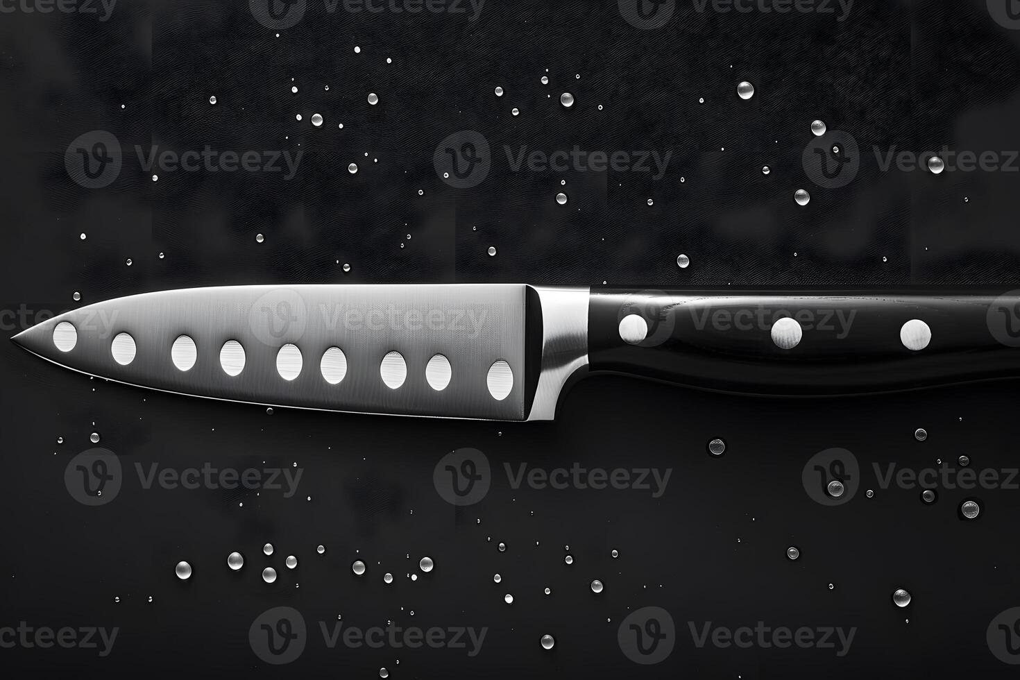 Professional Chef's Knife with Water Droplets on Dark Background Culinary Tool for Kitchen Design photo