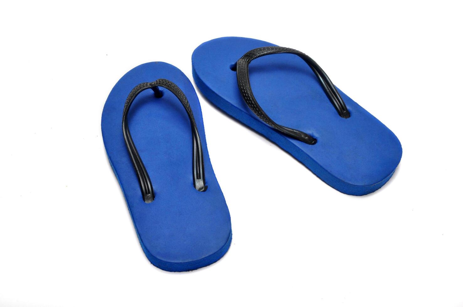 Blue children's sandals made of rubber white background photo
