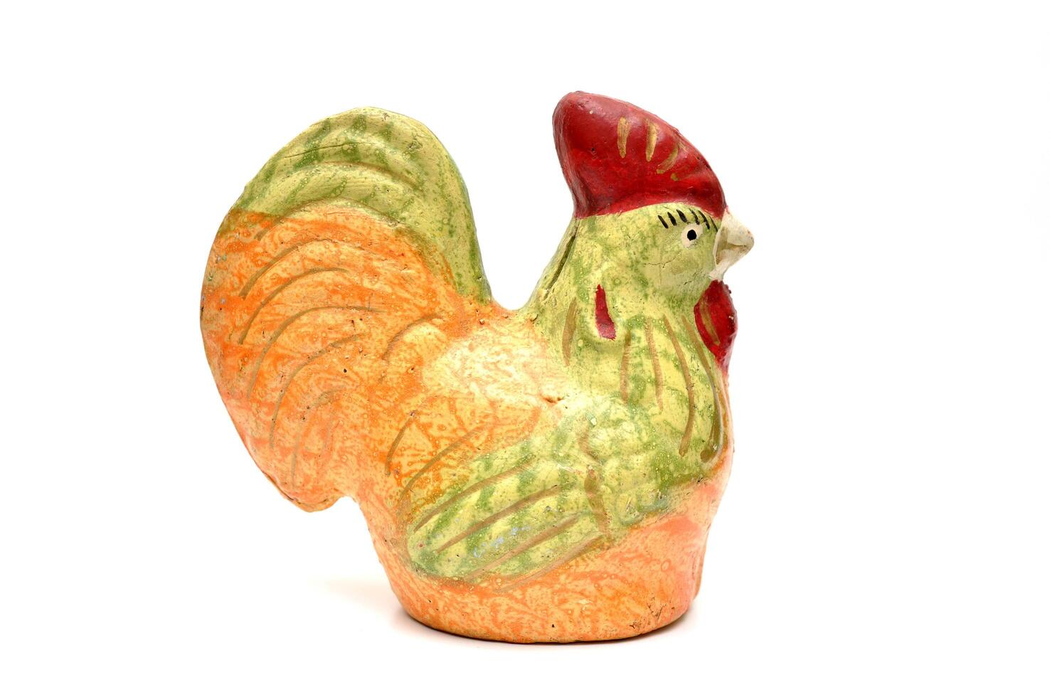 Colorful chicken piggy banks made of ceramic on a white background photo