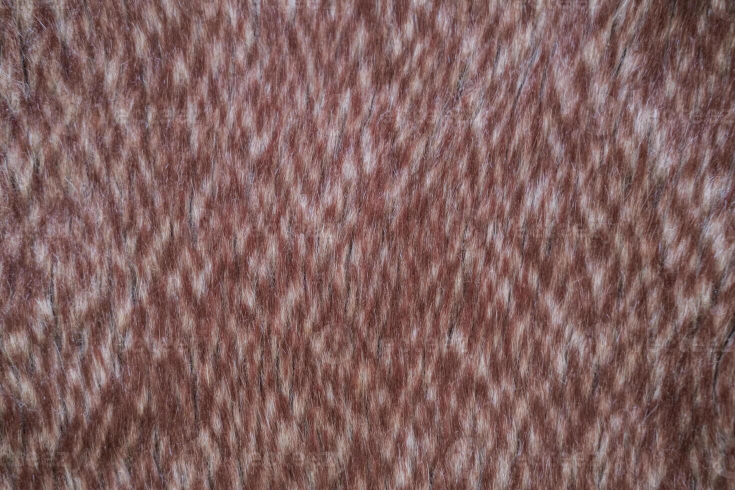 Texture of artificial fur fabric brown color photo