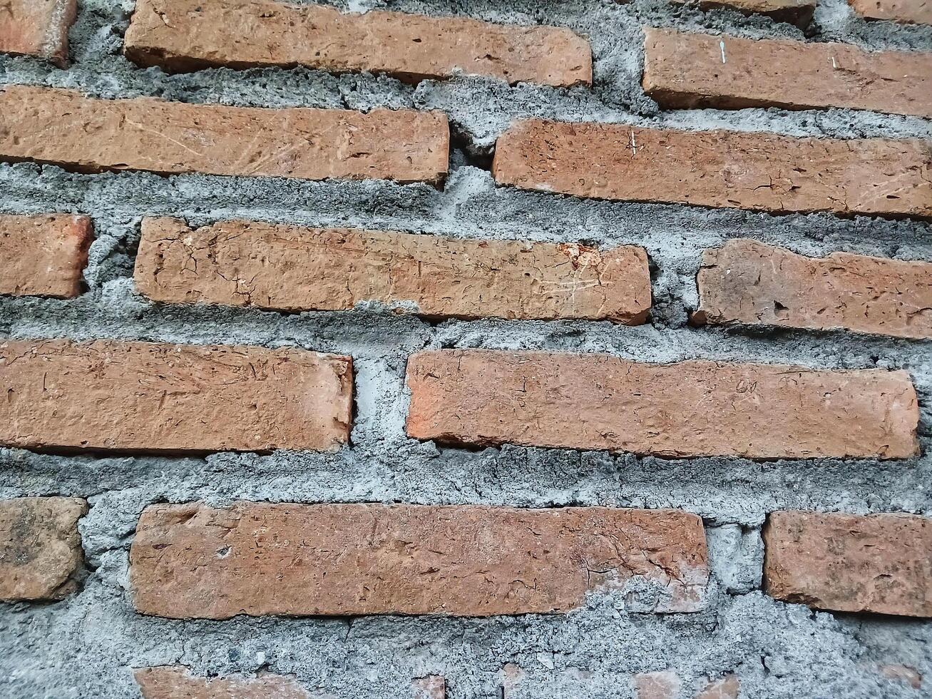 Brick background texture on the wall of the house. photo