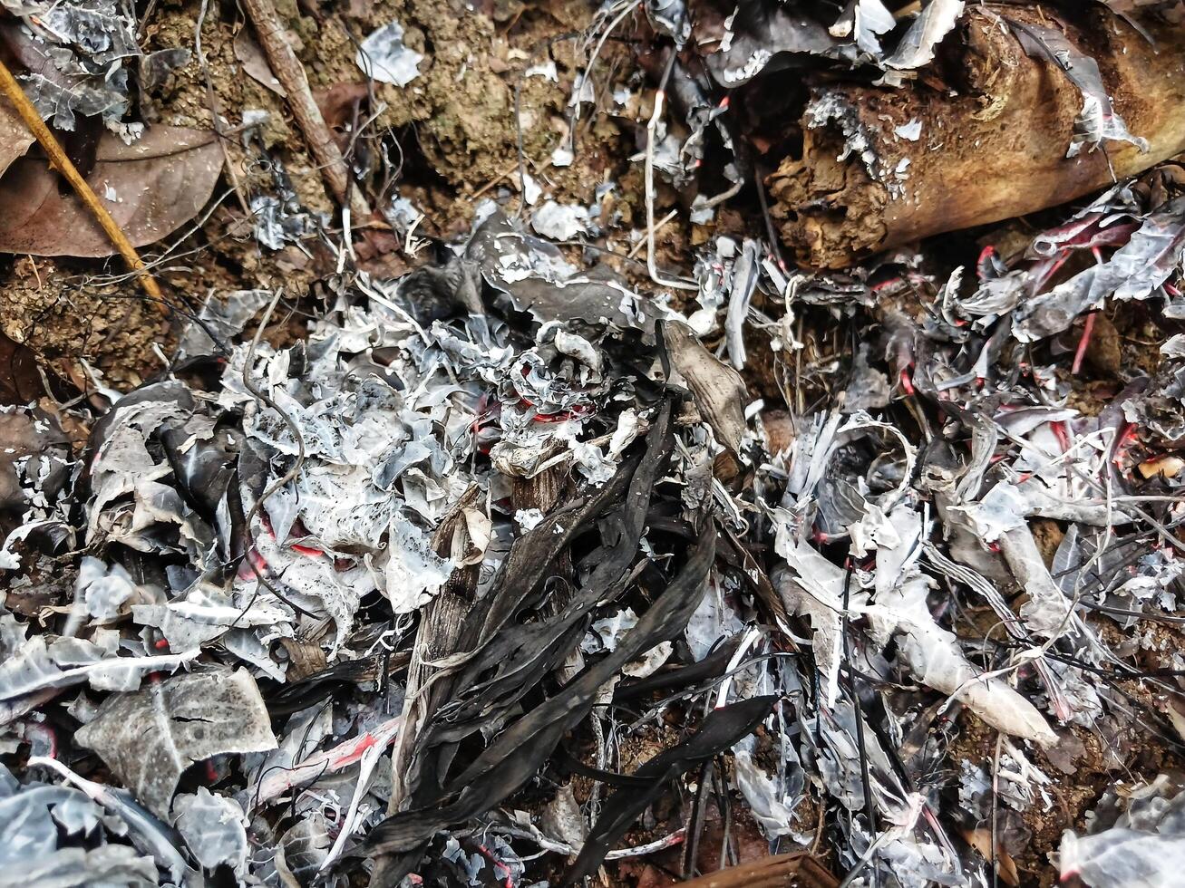 Background of dry leaves on the floor of a burning tropical forest. Bushfire. photo