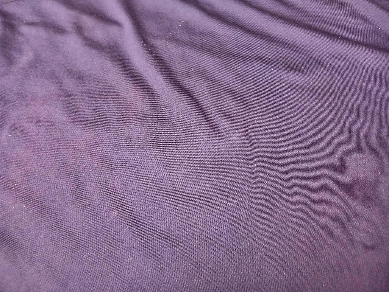 Black fabric with natural curves is good for backgrounds. photo
