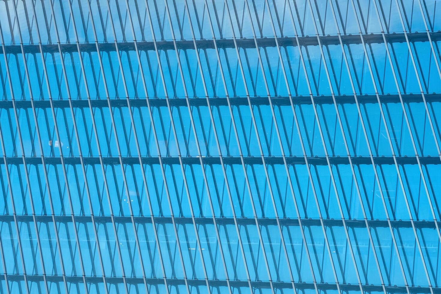 modern architectural background, glass and metal facade of contemporary building photo