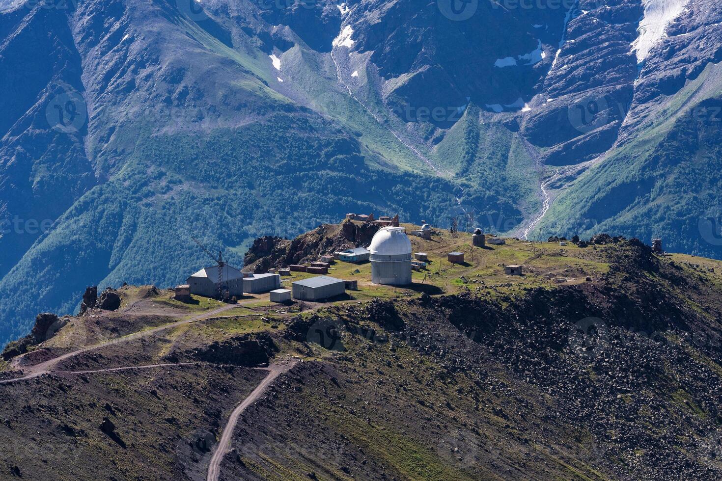 astronomical observatory in high mountainous terrain photo