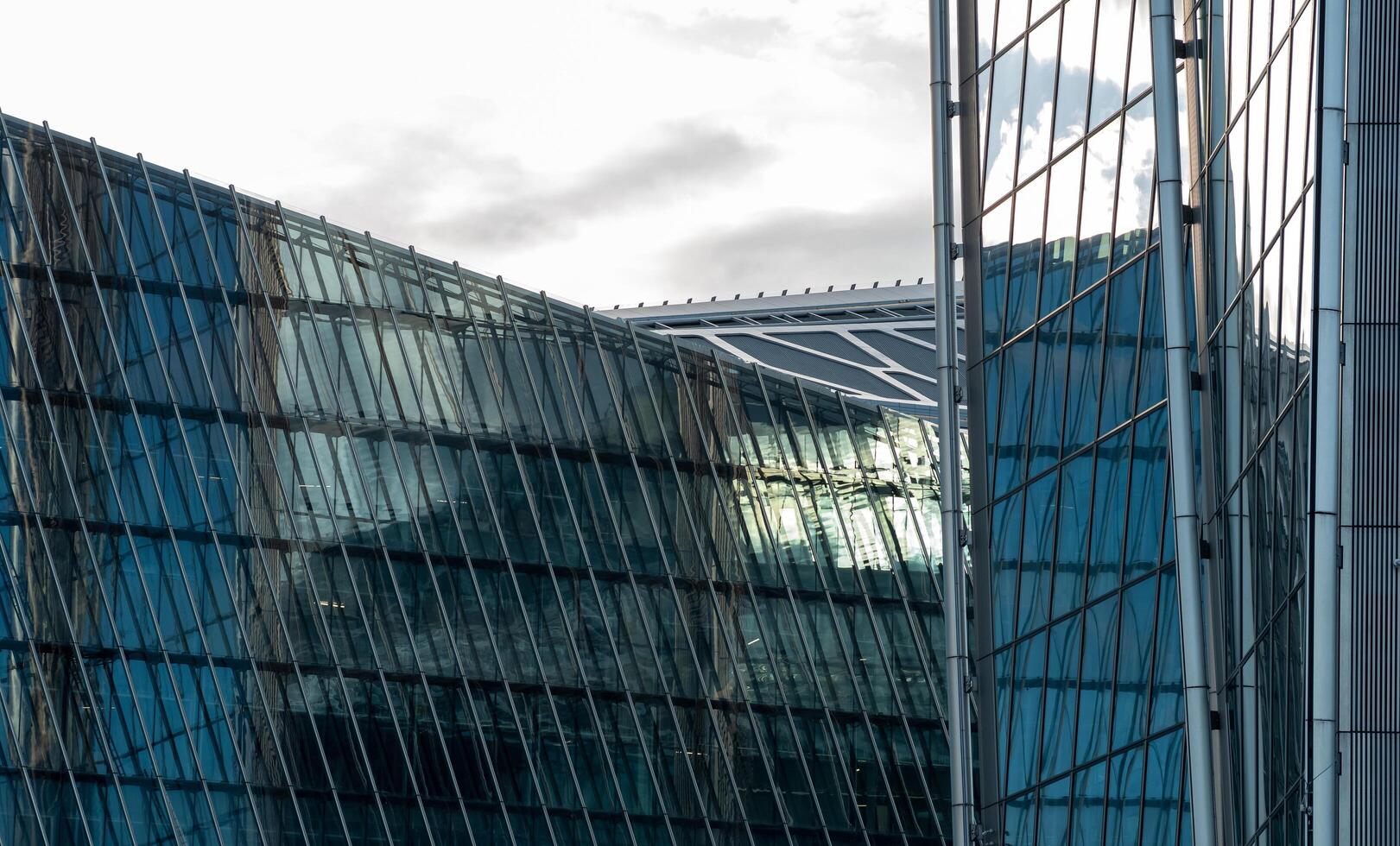 modern architecture, facade elements of contemporary building against evening sky photo