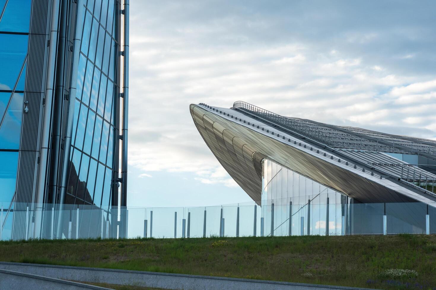 modern architecture, facade elements of contemporary buildings against evening sky photo