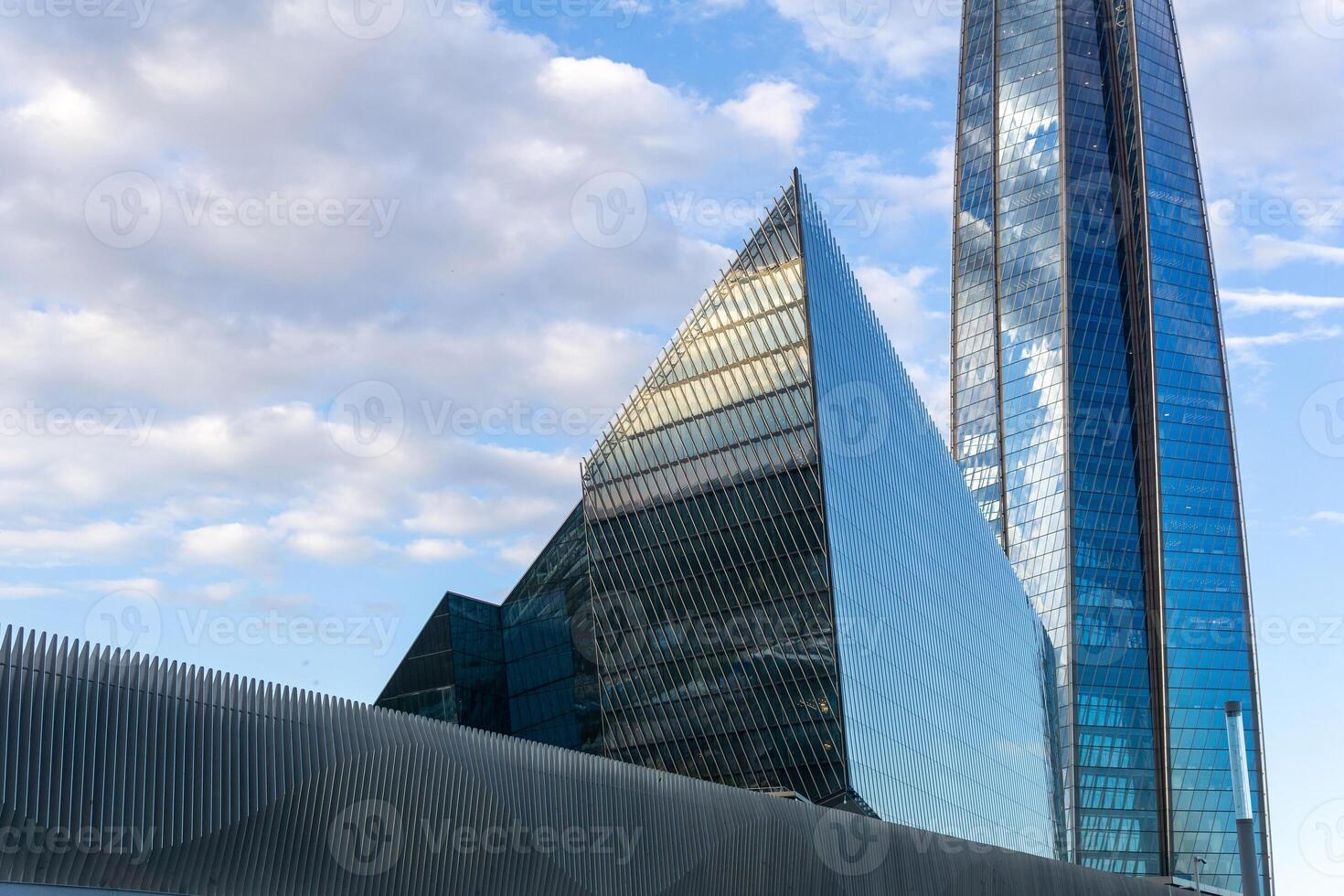 modern architecture, facade elements of contemporary building against evening sky photo