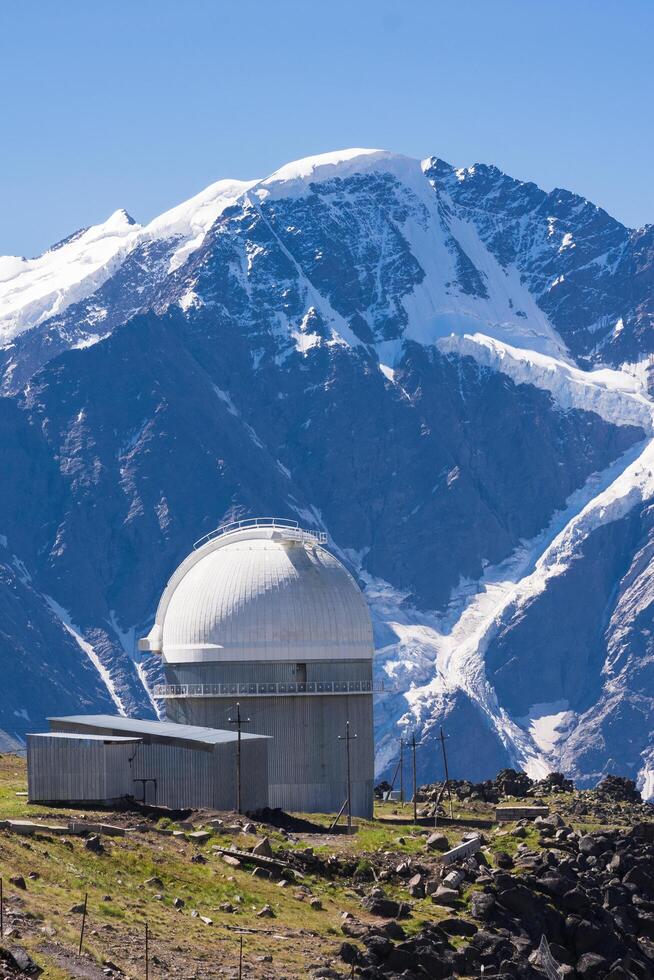 astronomical observatory in high mountainous terrain photo
