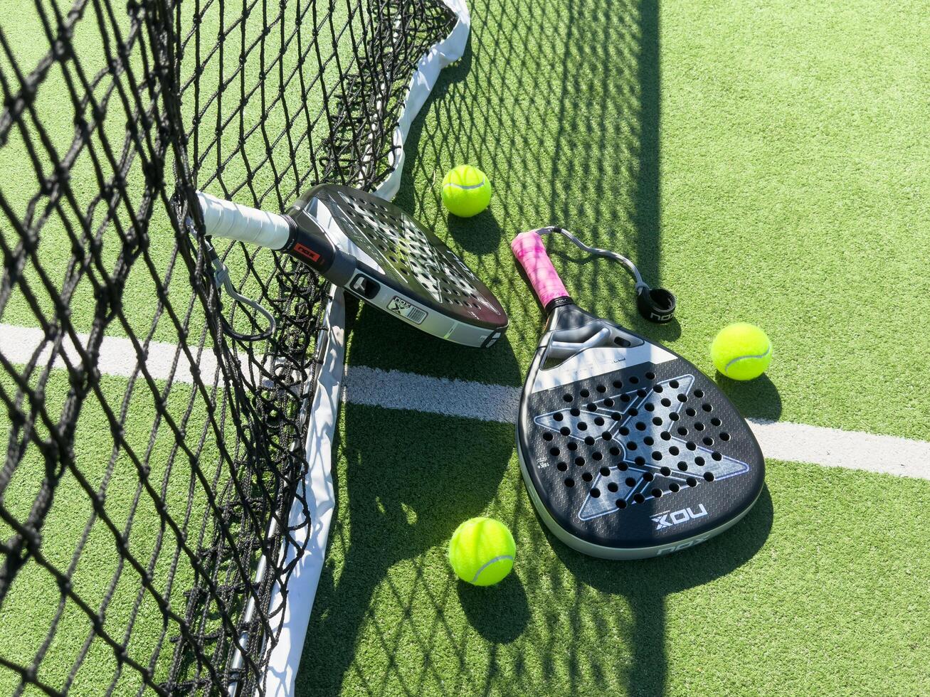Kyiv, Ukraine, July 14, 2024. Black professional paddle tennis racket nox. Horizontal sport theme poster, greeting cards, headers, website and app photo