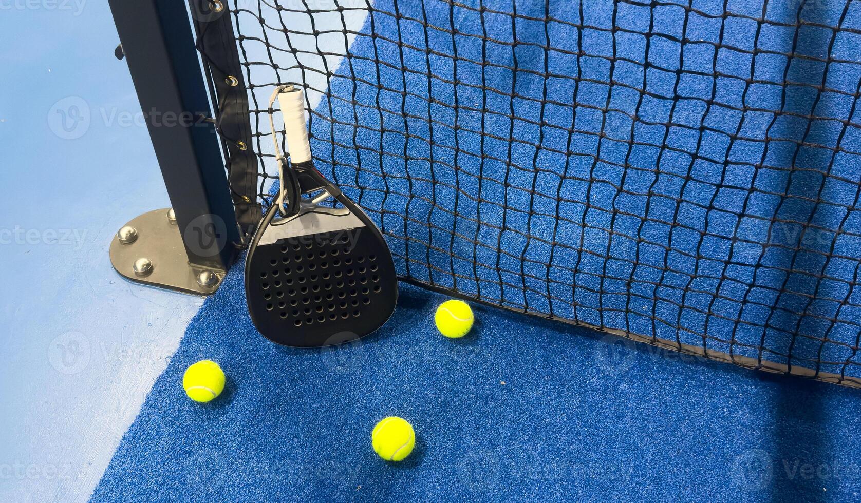 Paddle tennis racket and ball photo