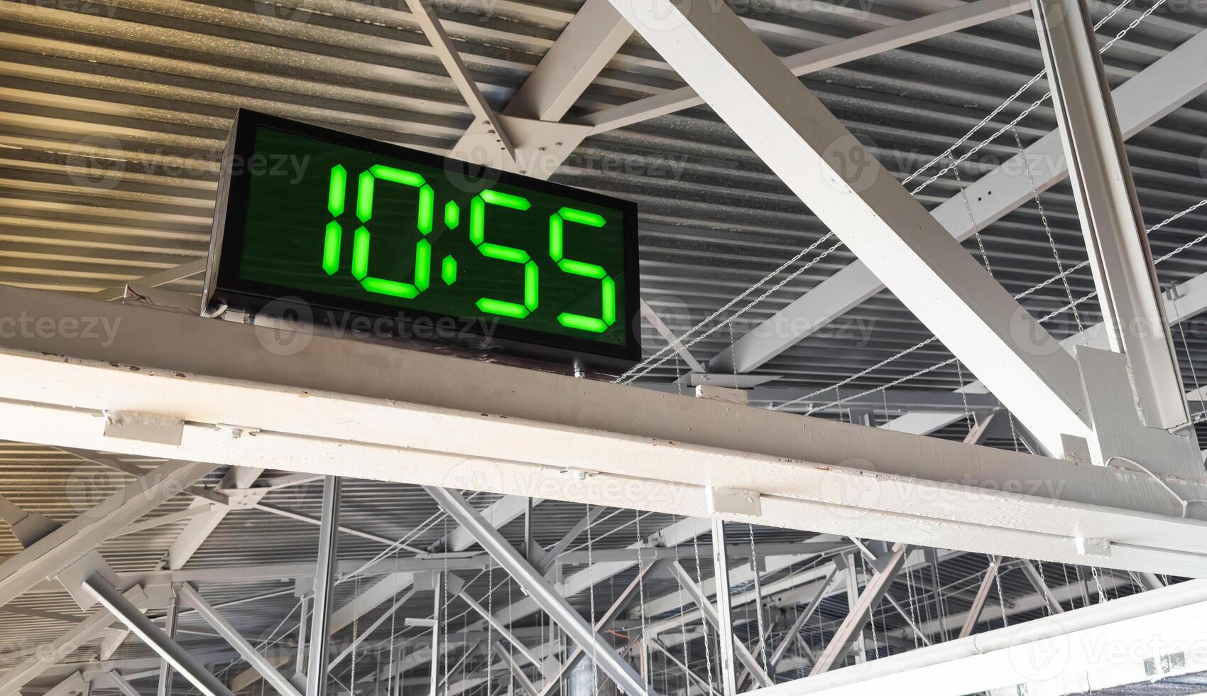 Digital clock in airport terminal. photo