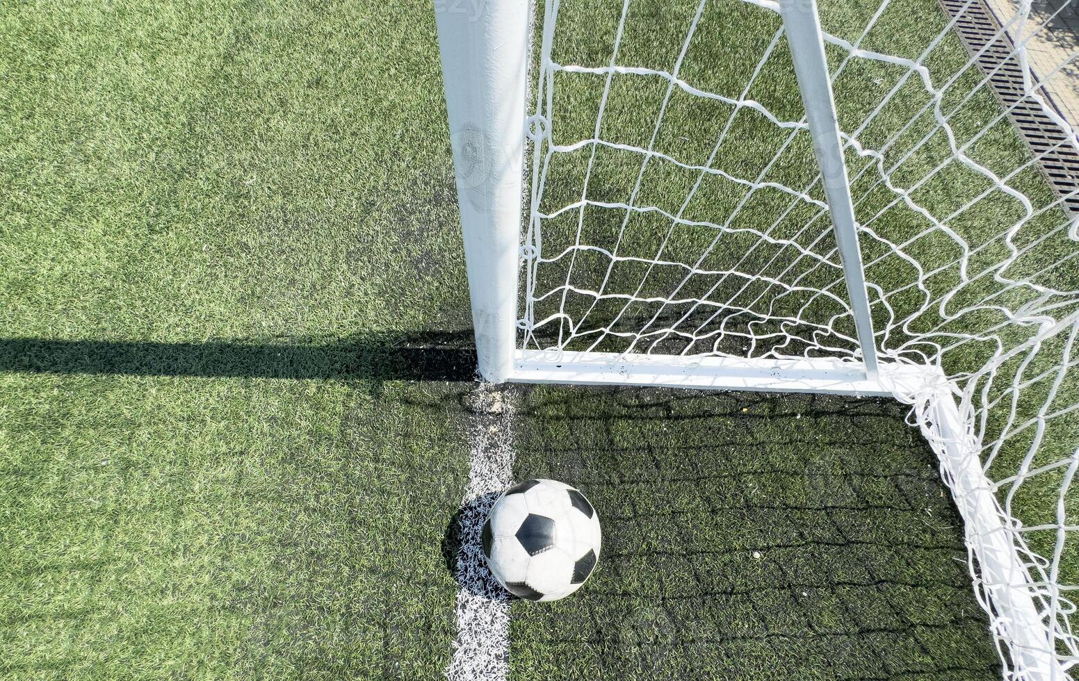 The ball hammered into a gate photo