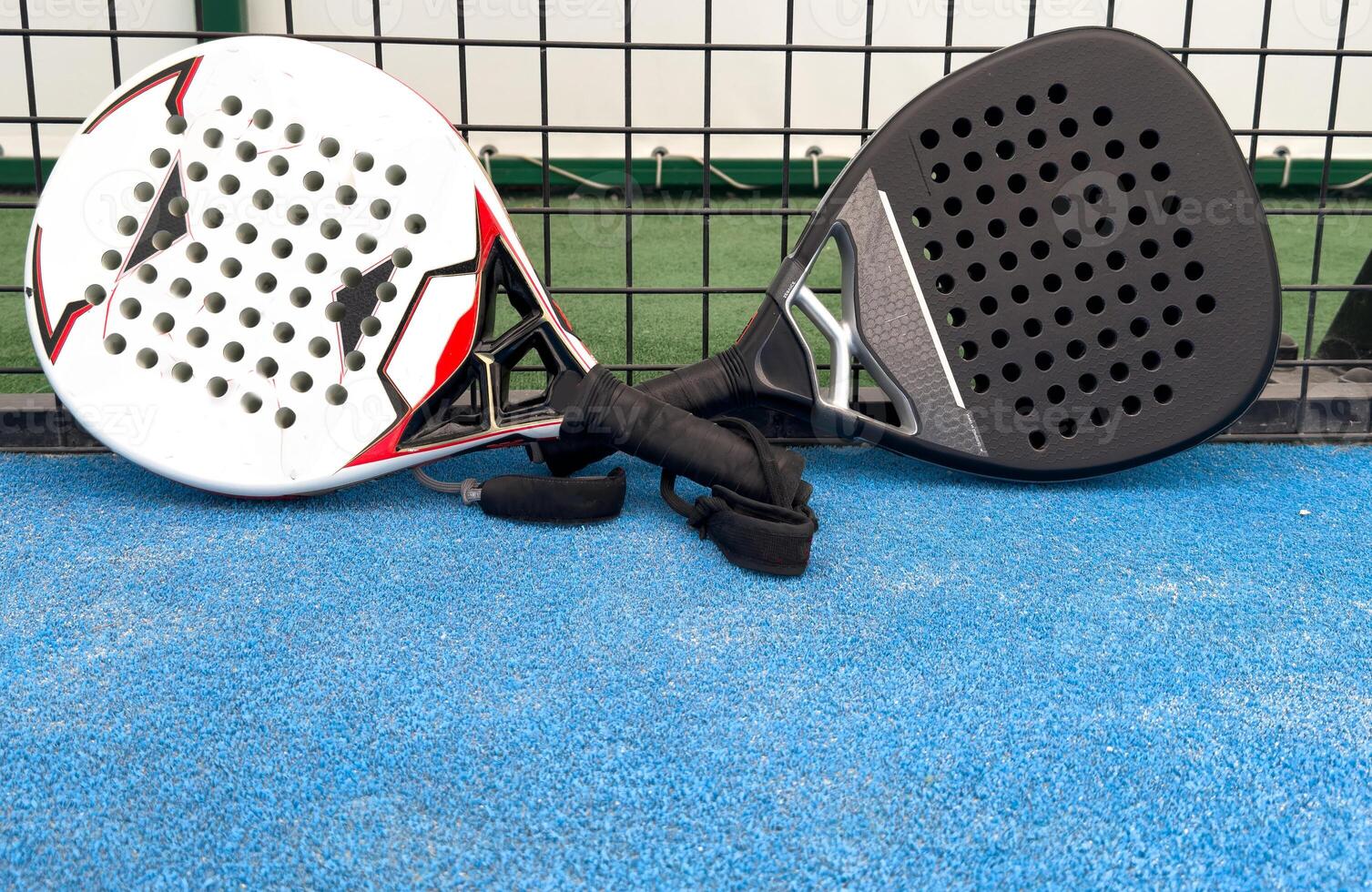 professional paddle tennis racket with natural lighting on court background. Horizontal sport theme poster, greeting cards, headers, website and app photo