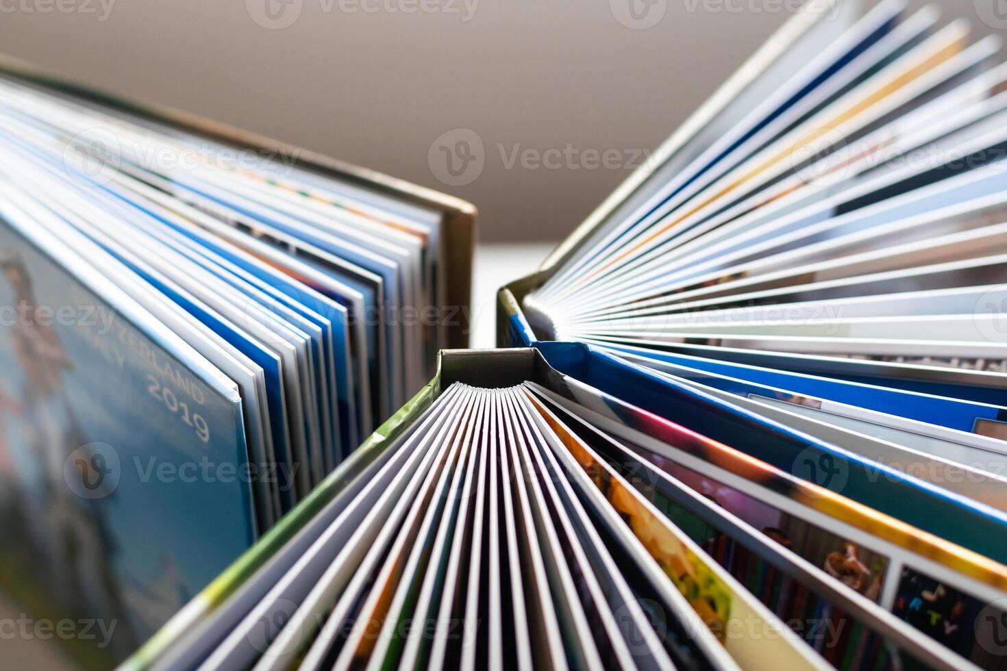 The spines of photo books. The view from the top