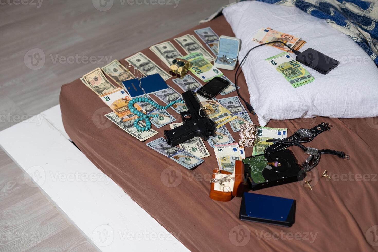 wallet with money out of a murder evidence bag, conceptual image photo
