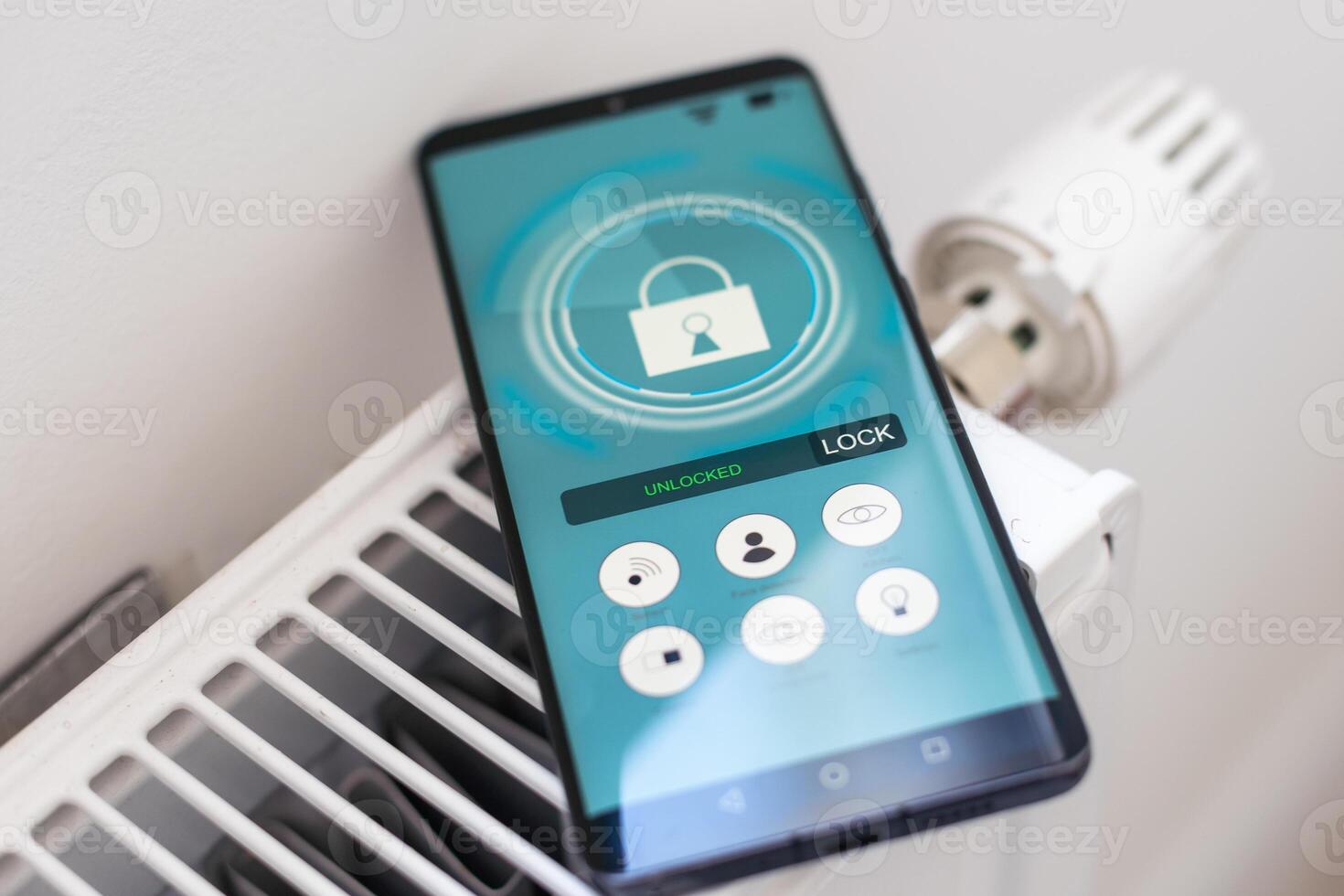 Smart Home. Man Controlling Heating Using App photo