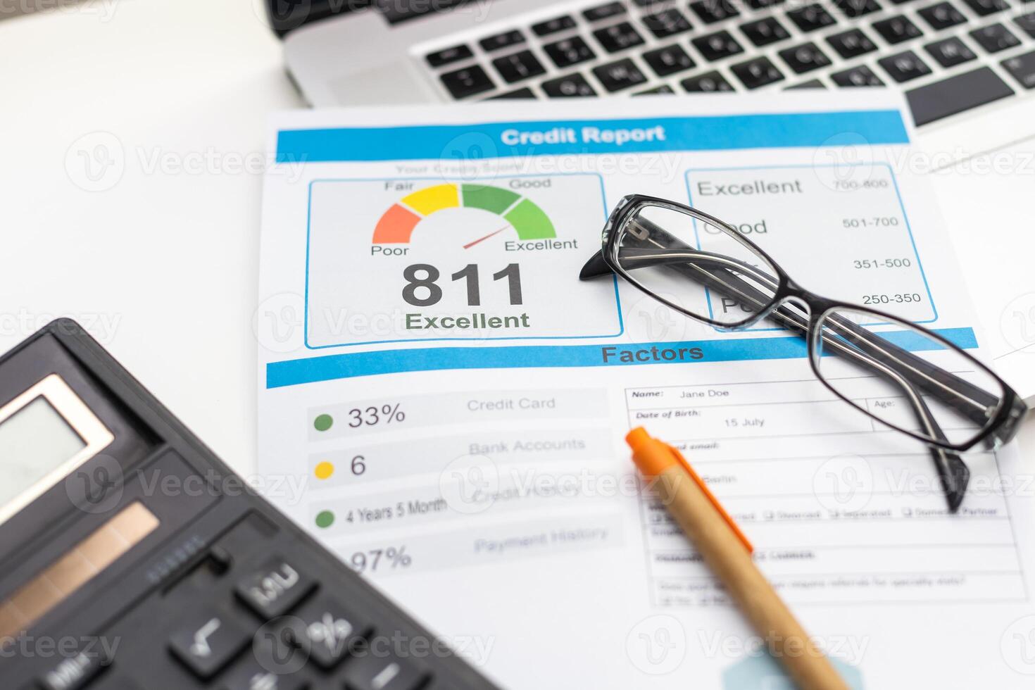 Credit score report with keyboard and pen photo