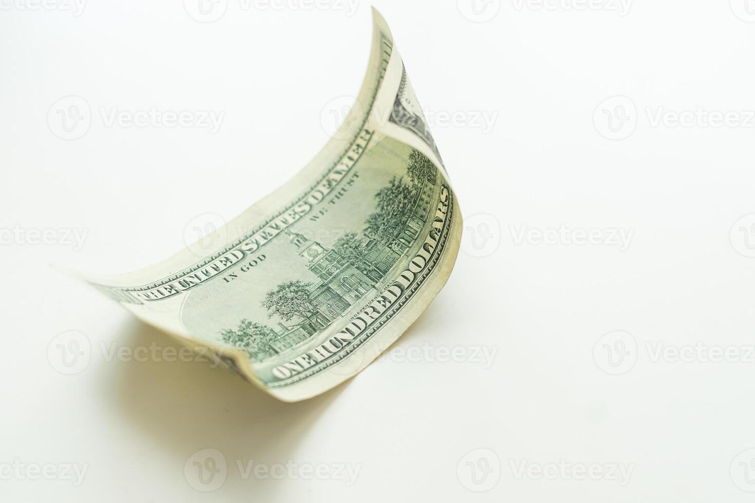 Bill in one hundred dollars isolated on white background. photo